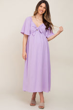 PinkBlush Lavender Textured Dot Front Tie Ruffle Sleeve Maternity Midi Dress on a model.