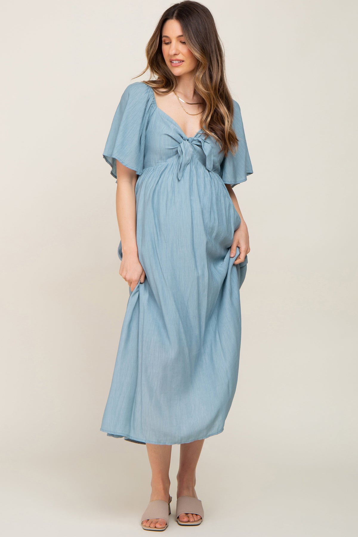 Blue Front Tie Ruffle Sleeve Maternity Midi Dress by PinkBlush (view 1 of 9)