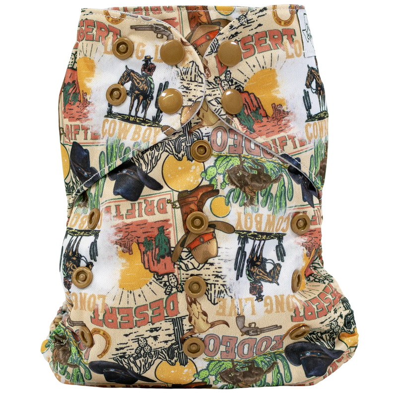 Slim Fit Pocket Cloth Diaper with cowboy-themed print and adjustable snaps for babies 8-40 lbs.