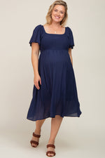 Navy Blue Smocked Square Neck Flutter Short Sleeve Maternity Plus Midi Dress by PinkBlush (view 1 of 5)