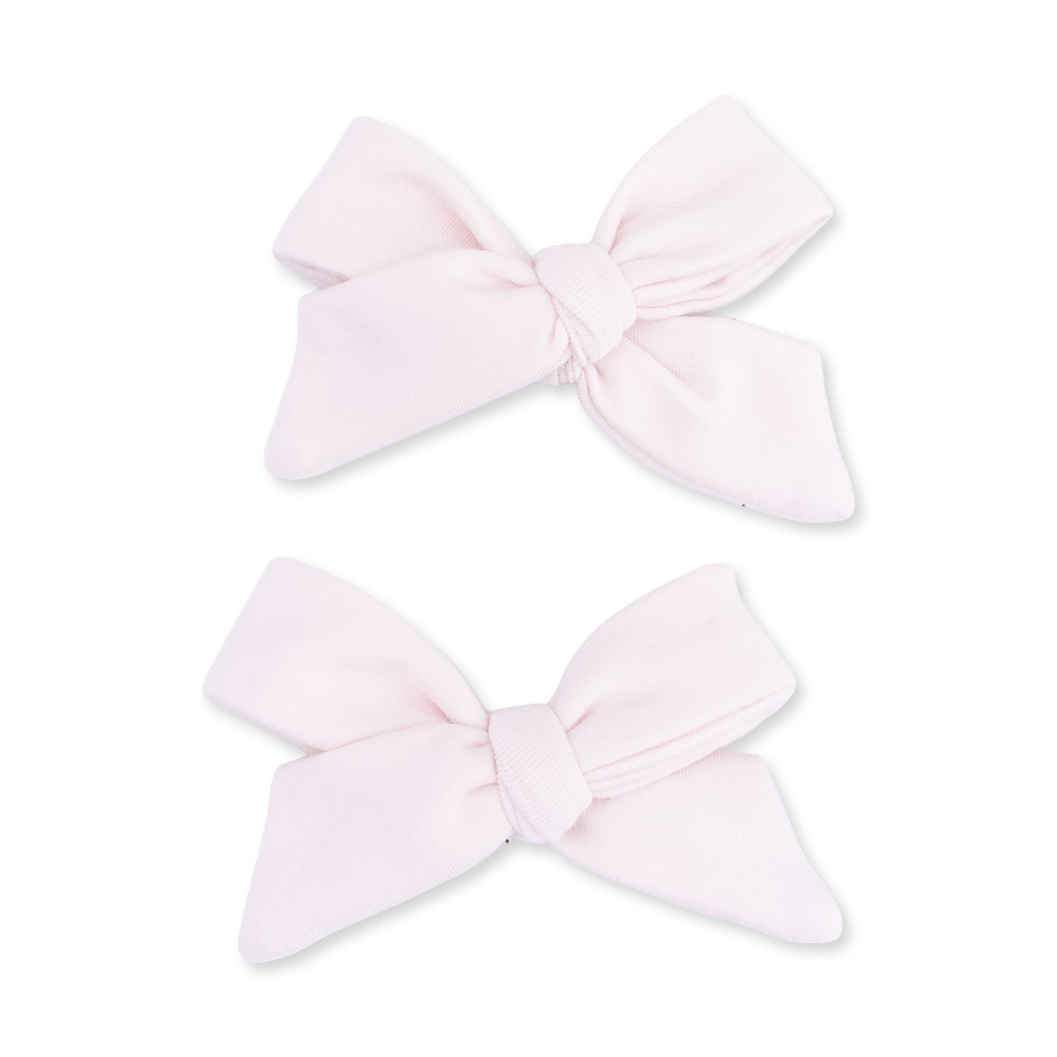 Two mauve bow-shaped hair clips for babies and toddlers
