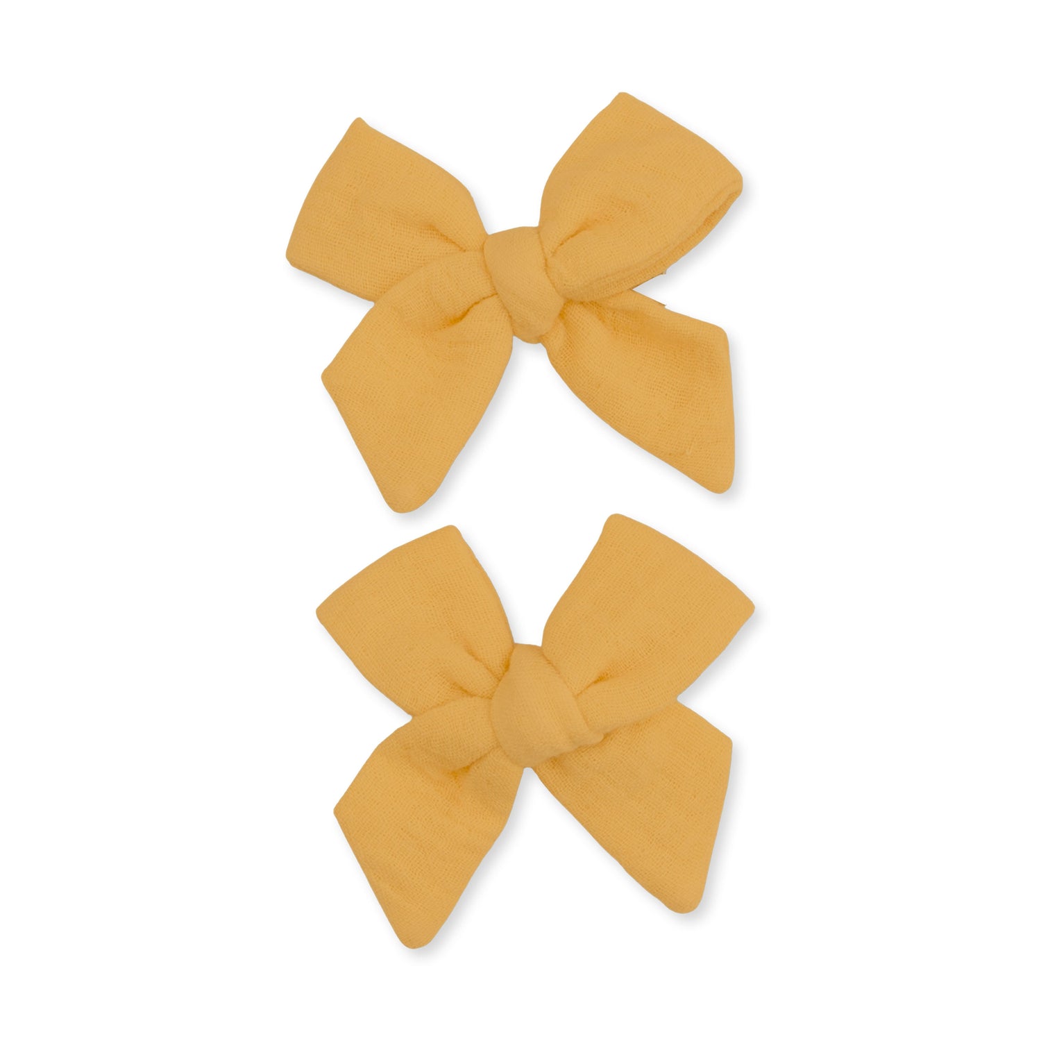 Pair of sunflower-print bow hair clips made from organic cotton muslin