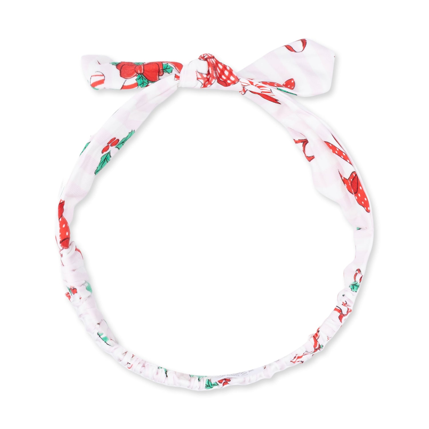 Baby knot headband in a bows and candy canes print on a light background