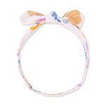 Baby knot headband in pink breakfast club print with a knotted detail at the front