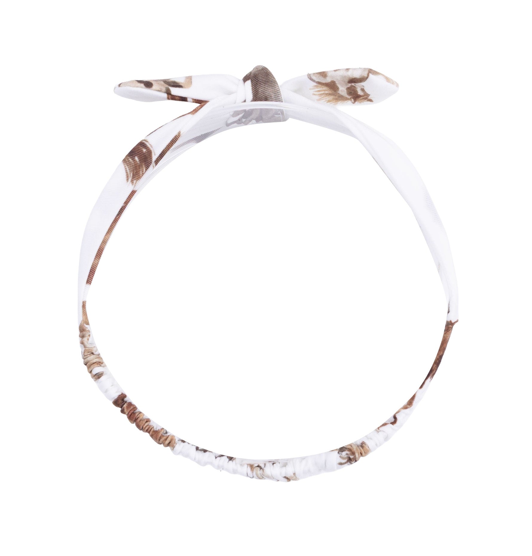 Baby knot headband in a wild horses print, showing the classic center knot detail.