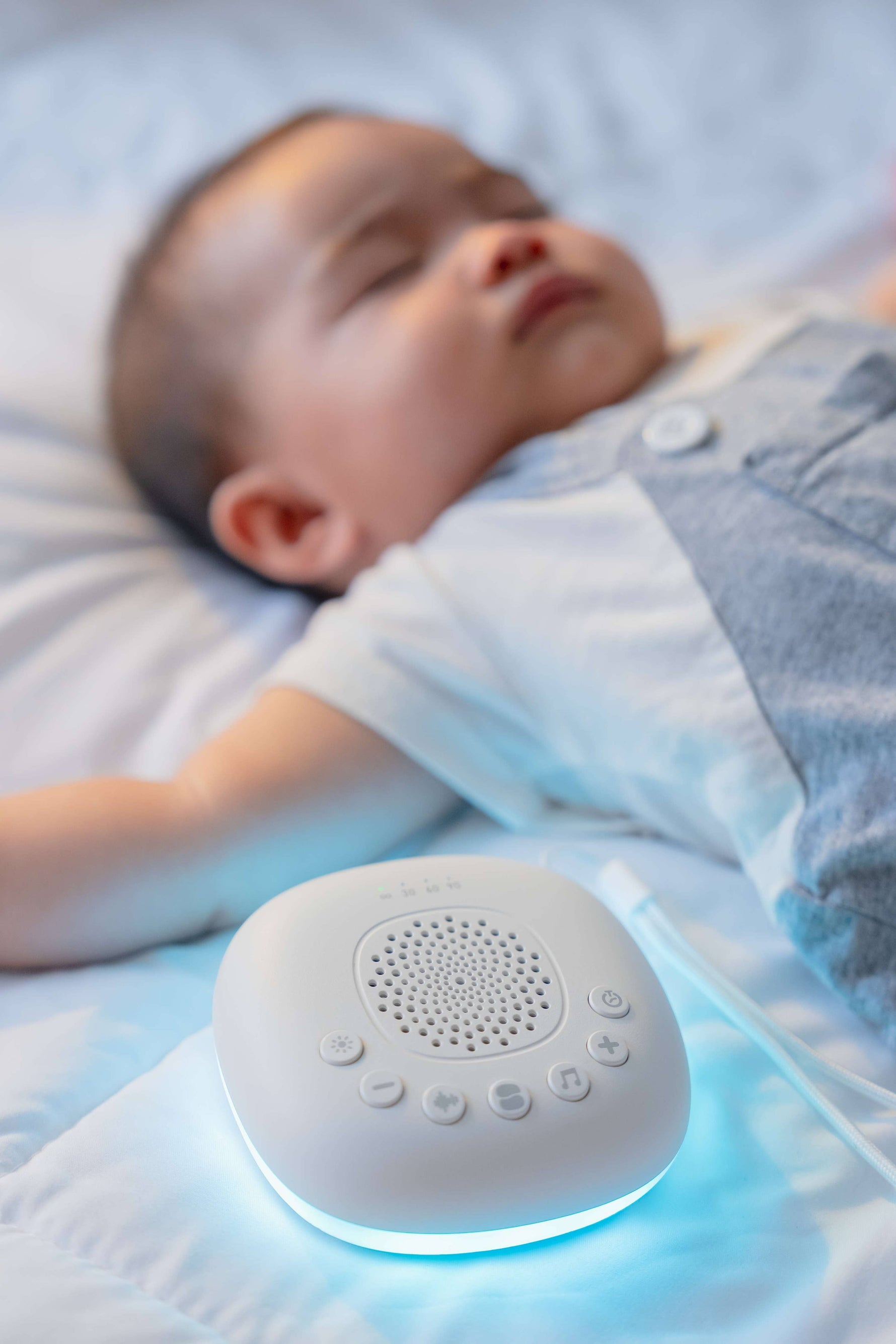 Sleeping Pal portable sound machine with night light and timer for babies.