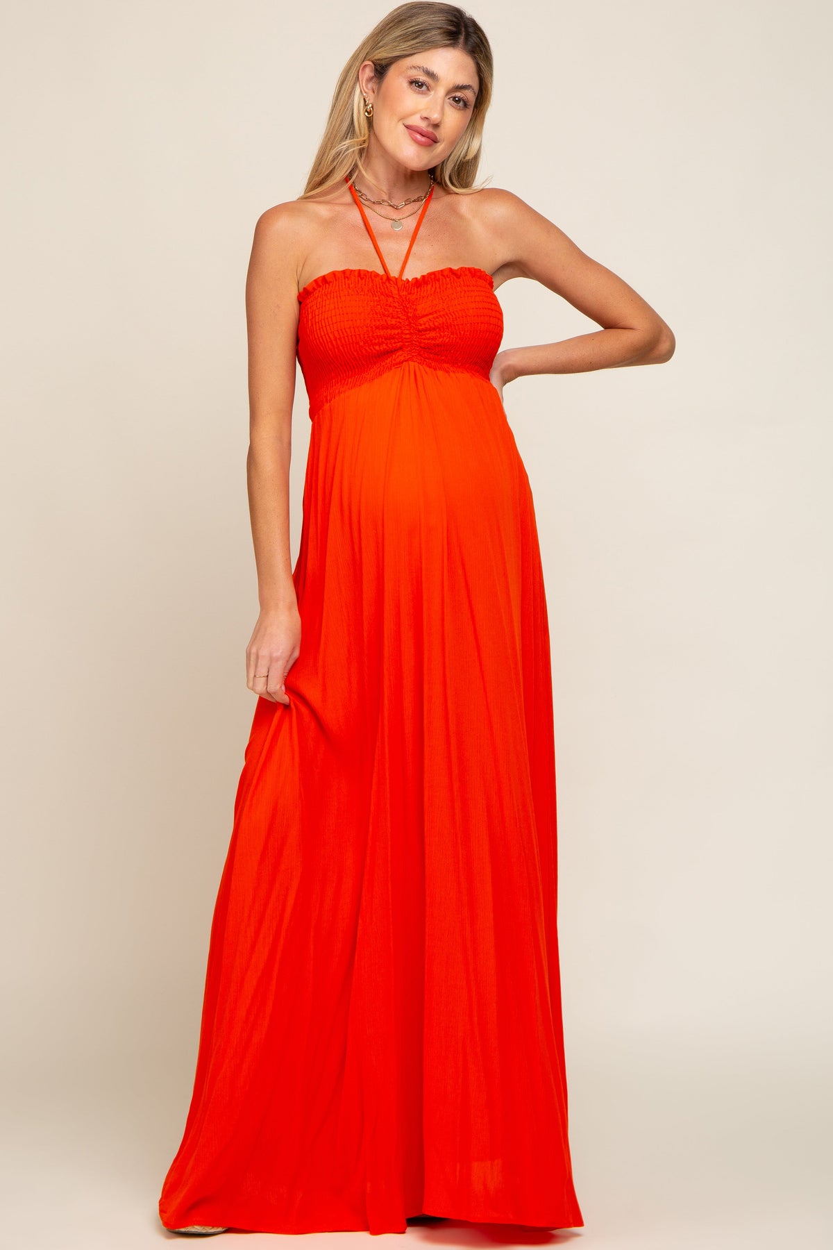 Orange Smocked Halter Maternity Maxi Dress by PinkBlush at Everetts Place