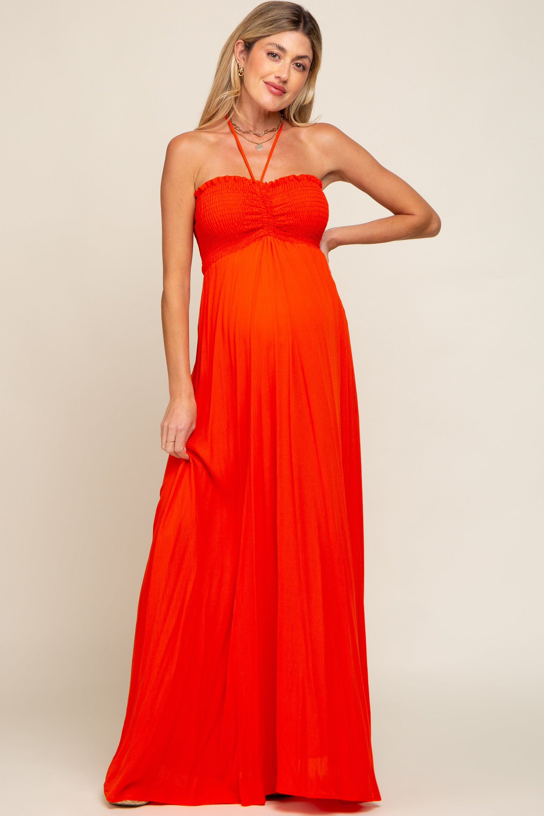 Orange Smocked Halter Maternity Maxi Dress by PinkBlush at Everetts Place