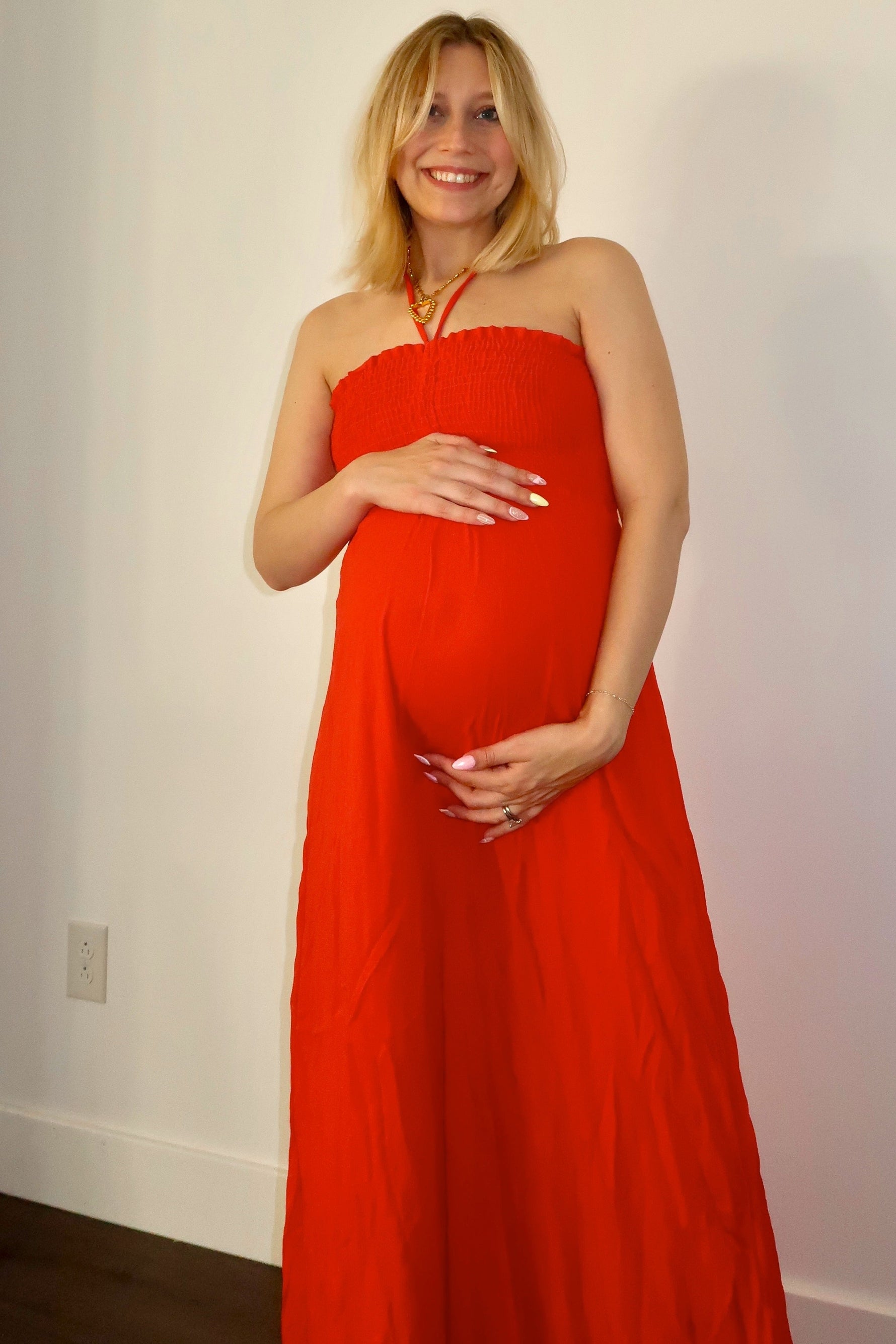 Orange Smocked Halter Maternity Maxi Dress by PinkBlush at Everetts Place