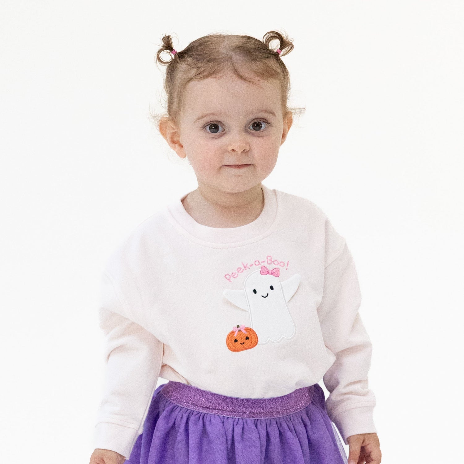 Pink drop sleeve baby sweatshirt with ghost and pumpkin applique and the words peek-a-boo