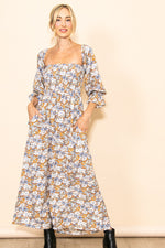 PinkBlush taupe floral off-shoulder smocked maternity maxi dress.