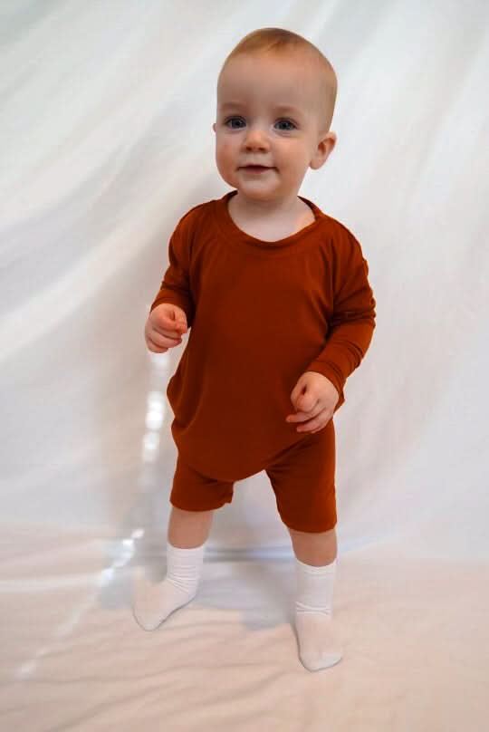 Children's biker short set in pecan brown with an oversized long sleeve top and matching shorts.
