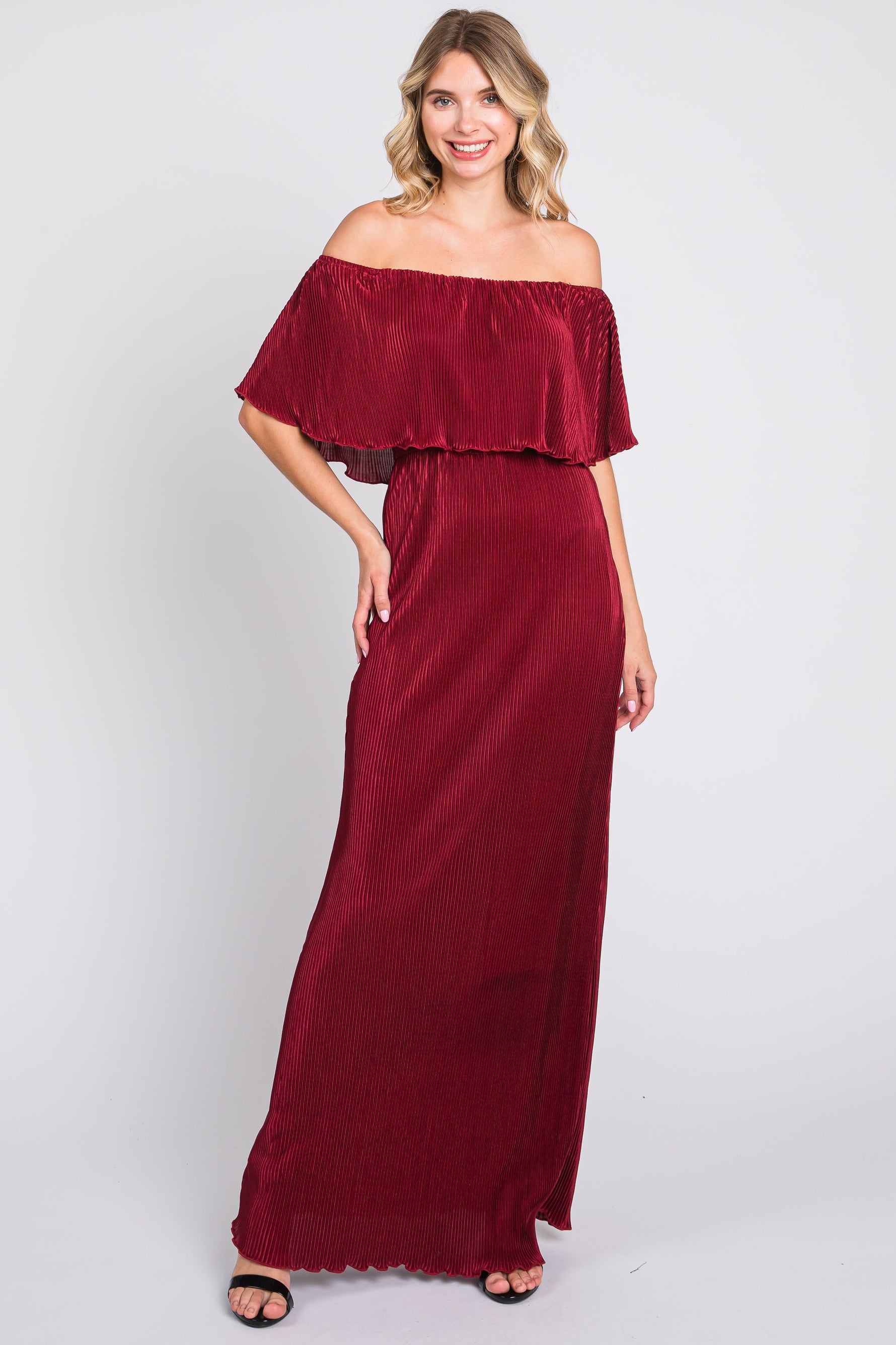 Burgundy pleated maxi dress with off shoulder neckline, short sleeves, and elastic waistband.