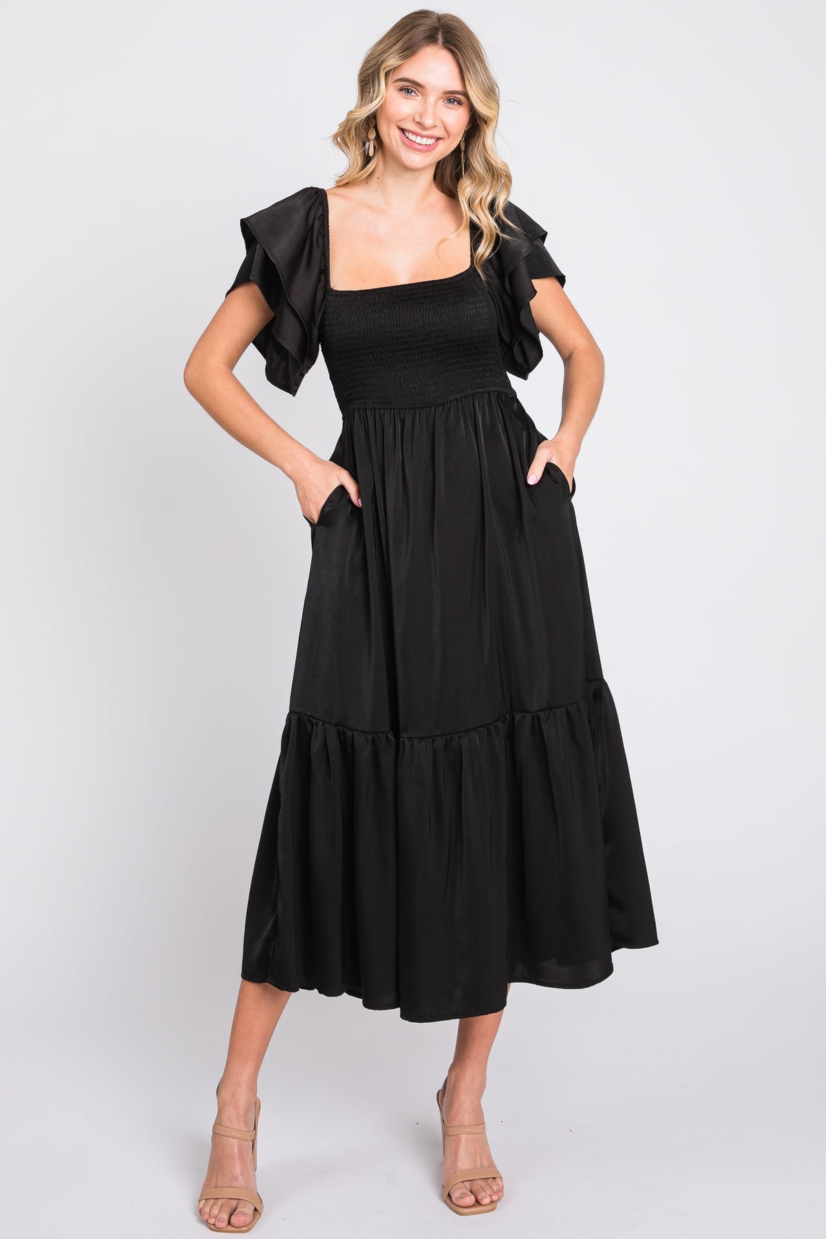Elegant black satin flutter sleeve maternity midi dress.