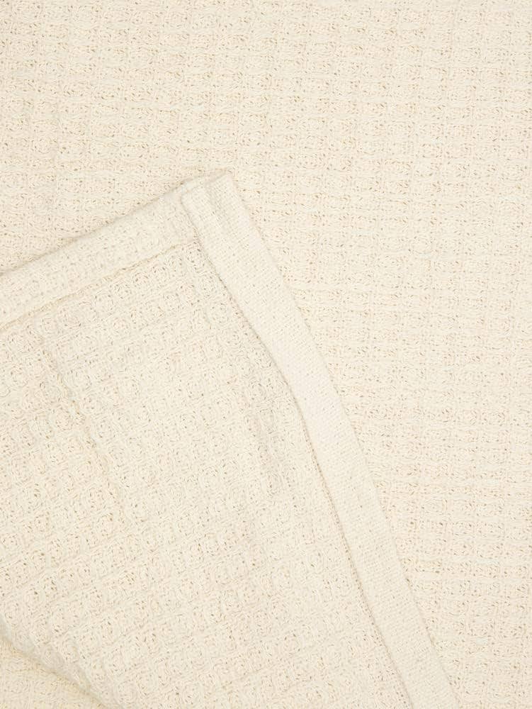 Crover 100% cotton waffle baby blanket for swaddling and stroller coverage.