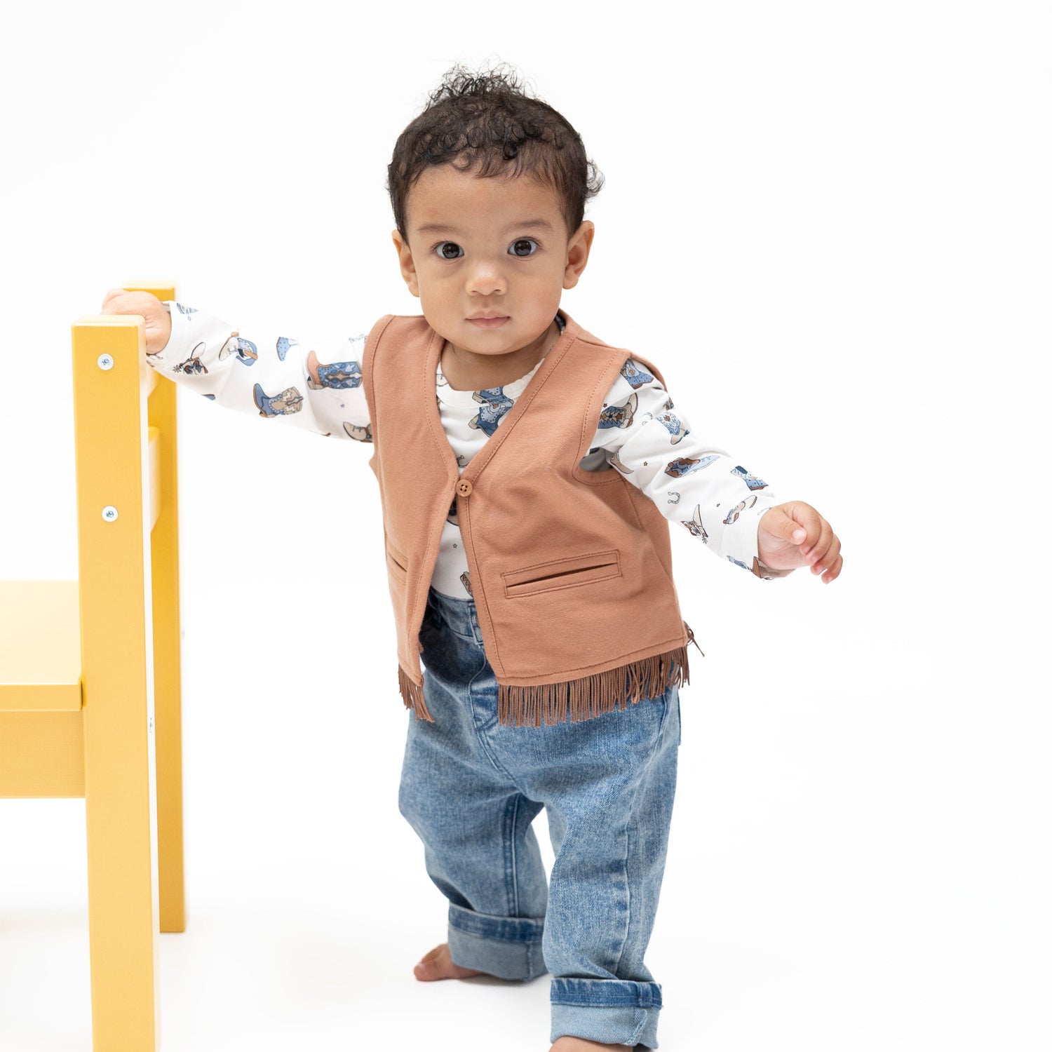 Sleeveless mocha brown French terry baby vest with western fringe detail along the front and hem
