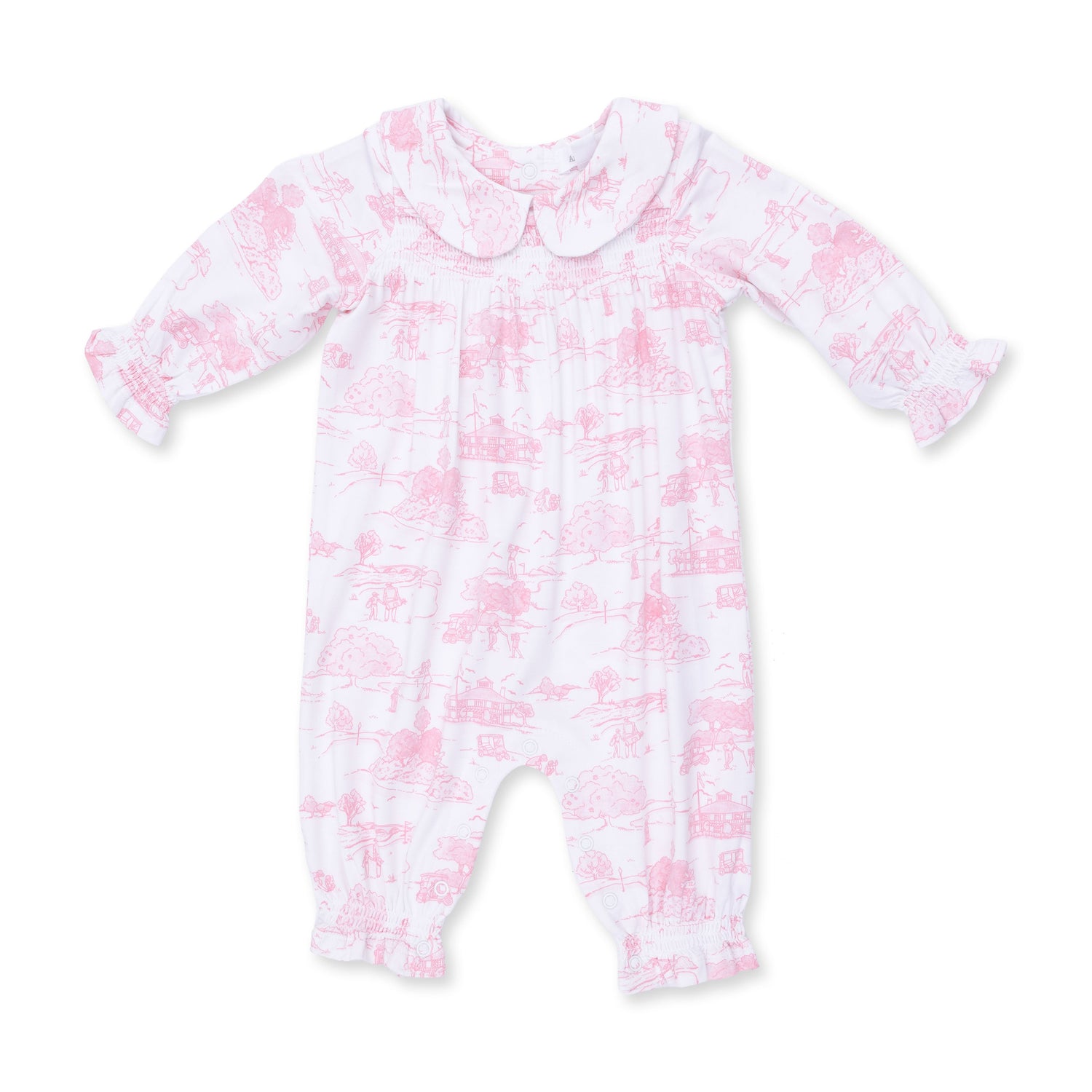 Long sleeve baby romper in pink golf toile print with smocked front and a Peter Pan collar.