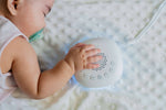 Sleeping Pal portable sound machine, night light & timer for babies.