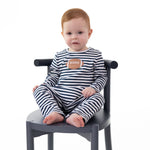 Navy long sleeve baby romper with football applique, snap shoulders and snap legs