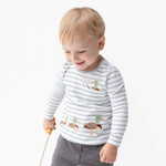 Long sleeve baby shirt with applique of a mama mallard duck leading her ducklings across the front
