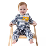 Long sleeve baby romper with snap shoulders and legs, featuring a digger construction truck pocket applique