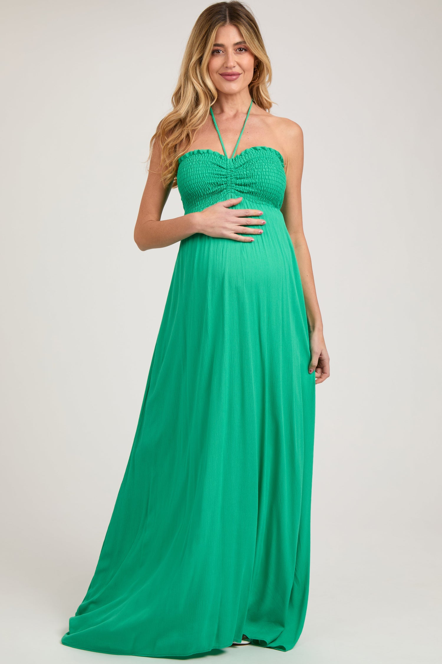 Green Smocked Halter Maternity Maxi Dress by PinkBlush at Everetts Place