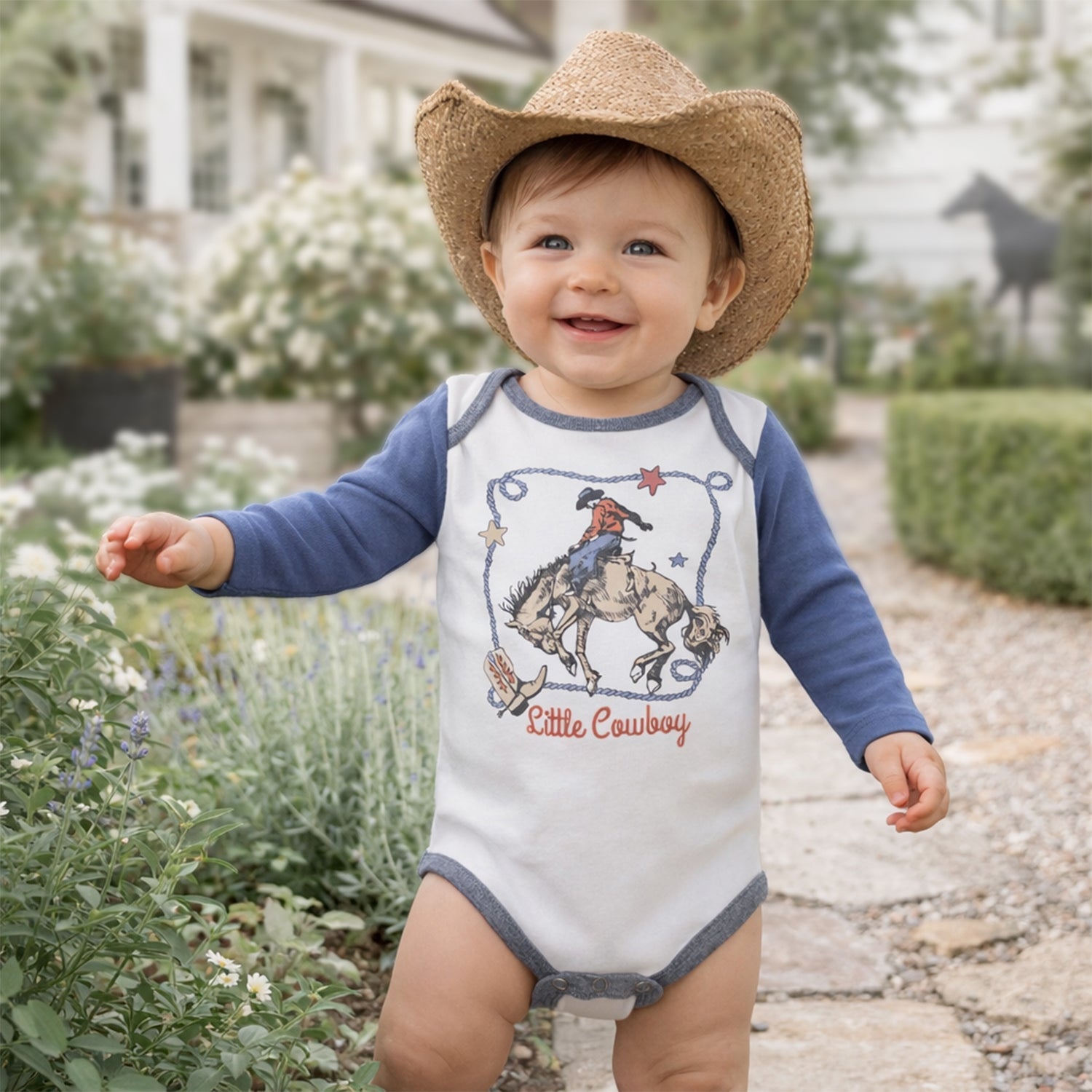 Long-sleeve baby bodysuit with Western cowboy-themed design and snap closures