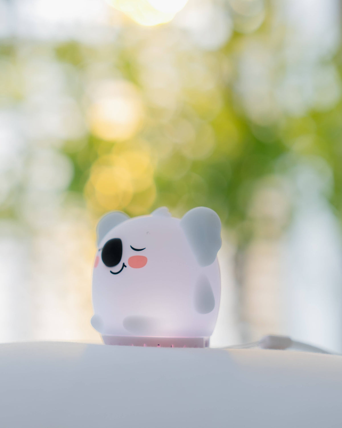 Sleeping Pal mini sound machine with night light for kids.