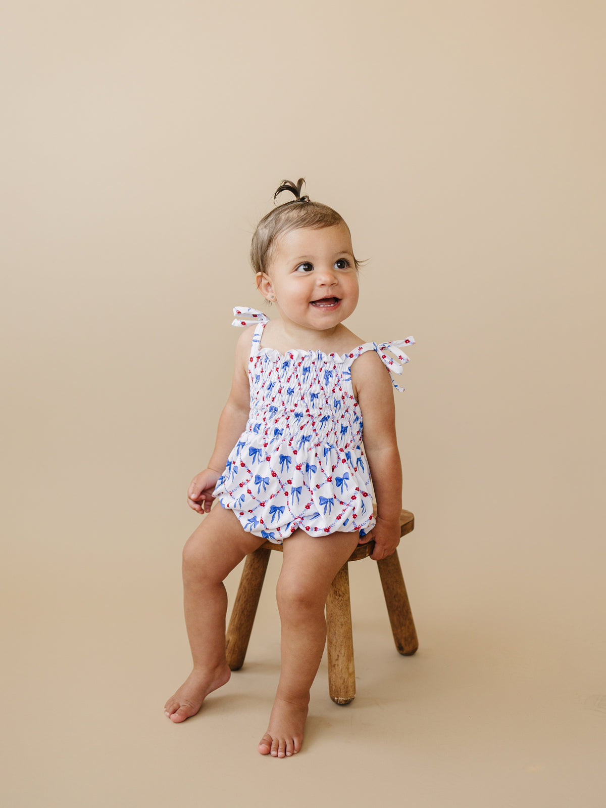 Smocked Red, White and Bows Bamboo Bubble Romper by Little Joy Co. at Everetts Place