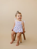 Smocked Red, White and Bows Bamboo Bubble Romper by Little Joy Co. at Everetts Place