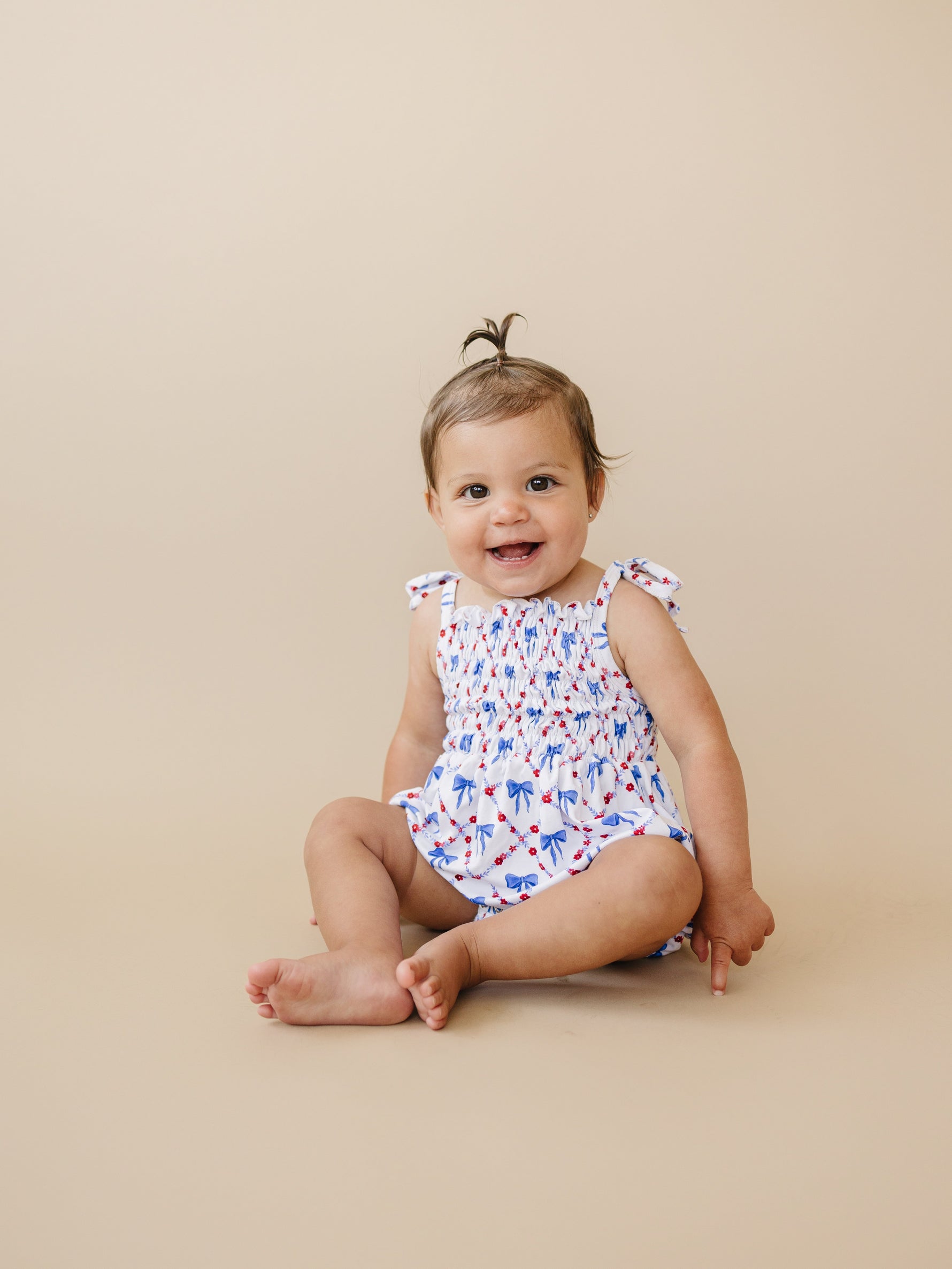 Smocked Red, White and Bows Bamboo Bubble Romper by Little Joy Co. at Everetts Place