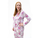 Dahlia floral coat-style pajama set with long sleeve top and matching pants with pockets and piping