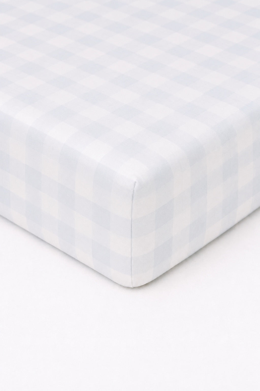 Light blue gingham checkered crib sheet in cotton fabric