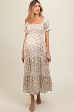 Cream floral smocked square neck tiered puff short sleeve maternity maxi dress.