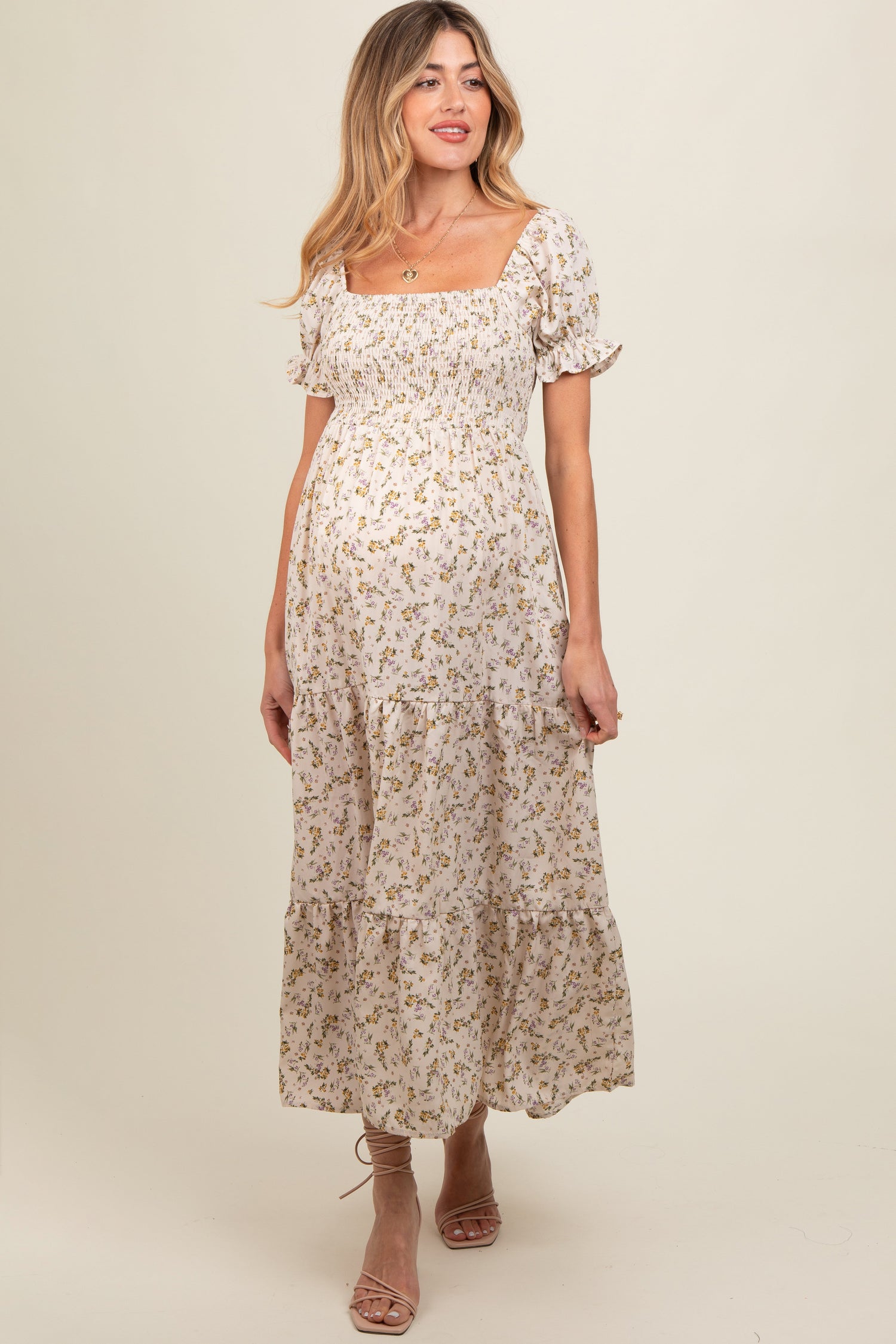 Cream floral smocked square neck tiered puff short sleeve maternity maxi dress.