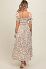 Cream floral smocked square neck tiered puff short sleeve maternity maxi dress.