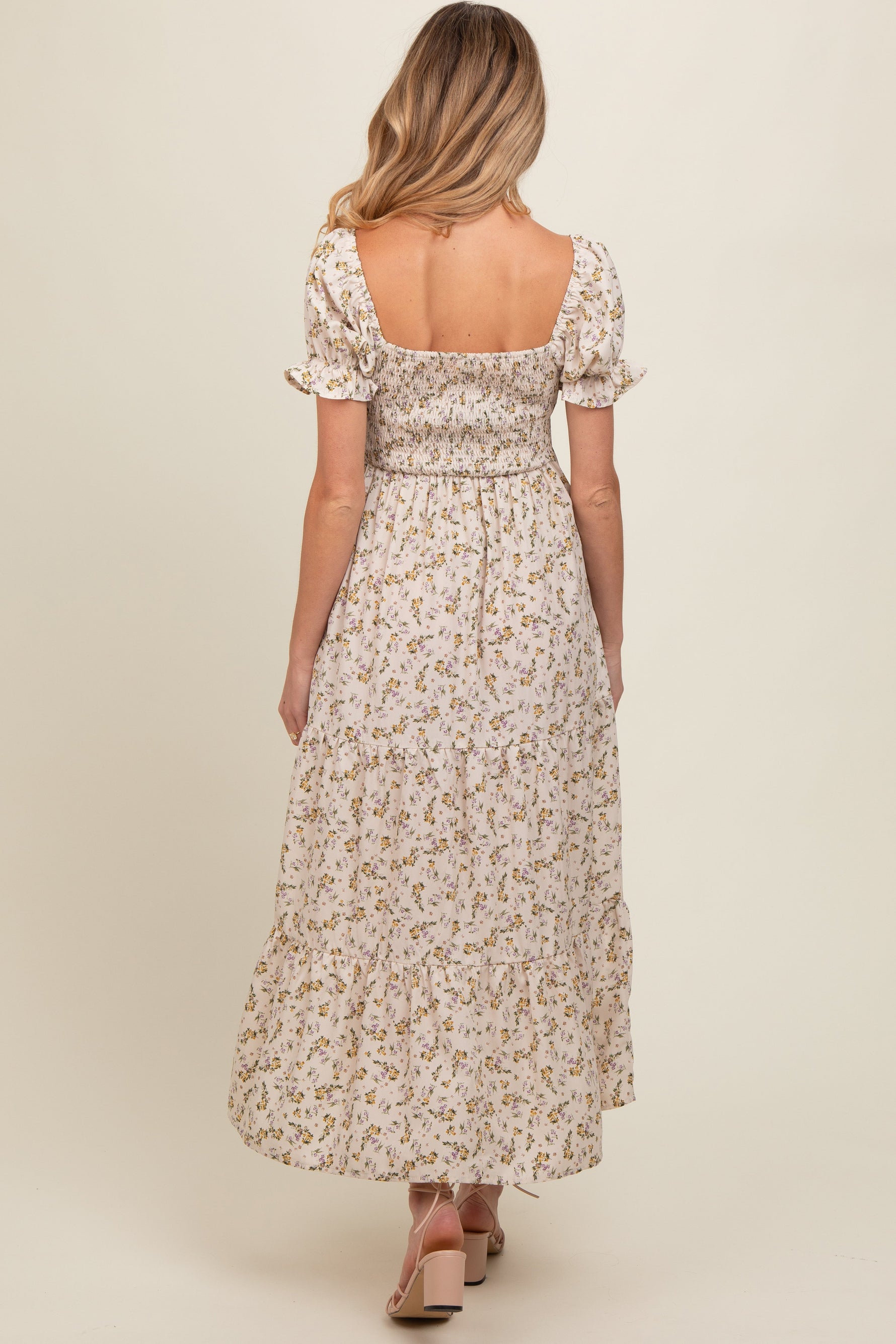Cream floral smocked square neck tiered puff short sleeve maternity maxi dress.