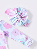 Clover Cottage baby gown with headband, soft bamboo cotton for newborns.