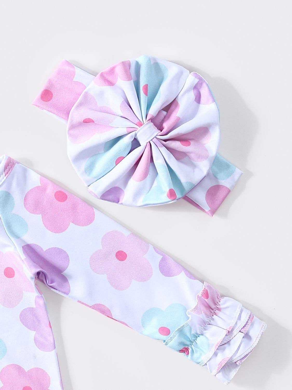 Clover Cottage baby gown with headband, soft bamboo cotton for newborns.