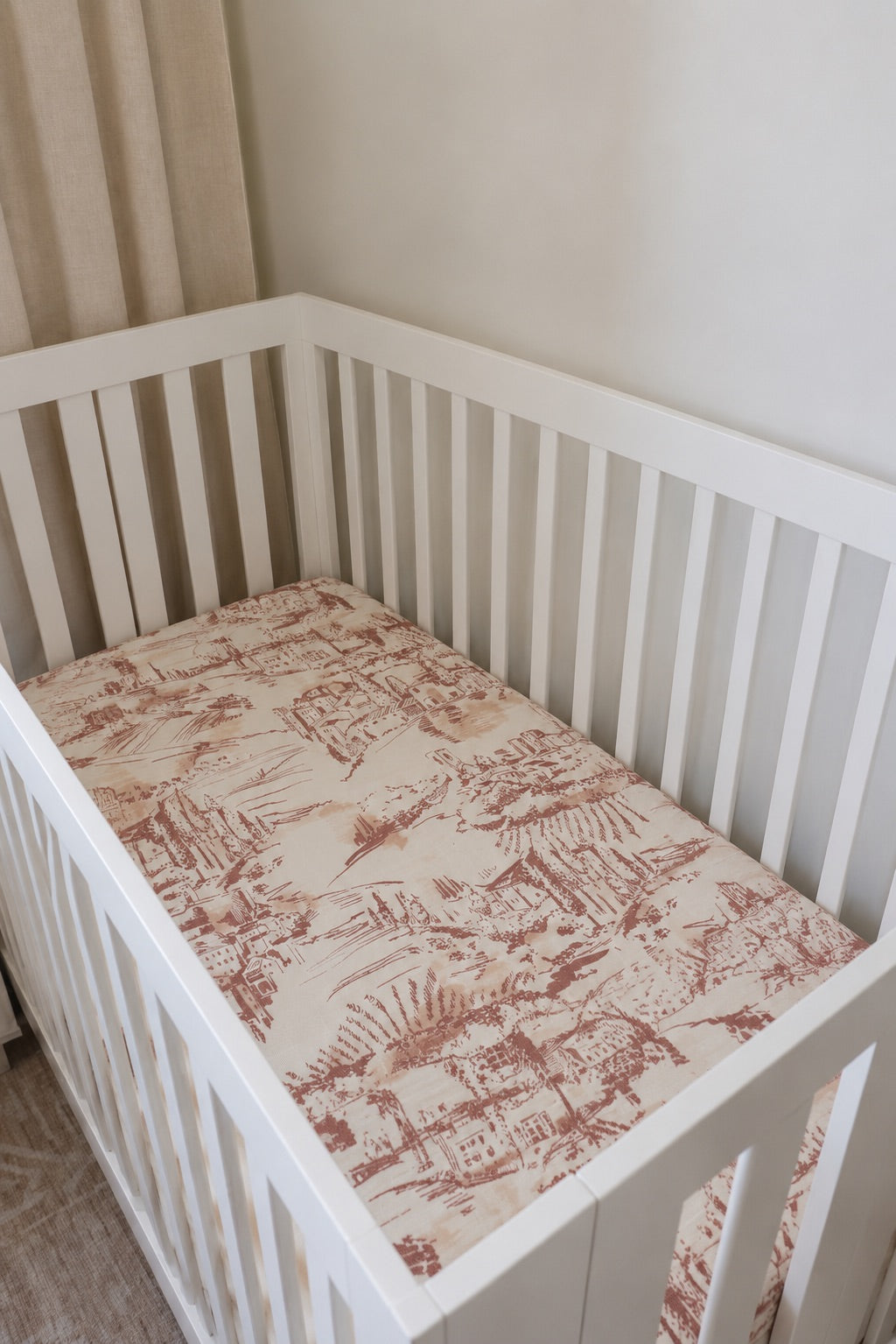 Cotton crib sheet with toile print, standard fit for a crib mattress