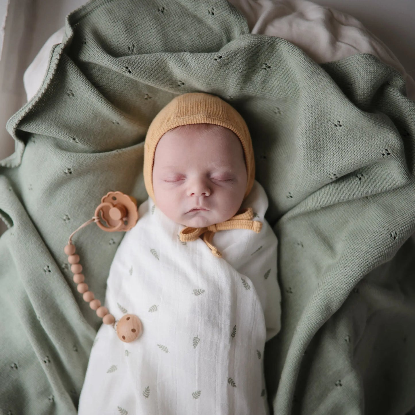 Organic Cotton Muslin Swaddle Blanket for Baby Cuddling and Nursing Mushie