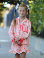 Girls two-piece pajama set with pumpkin and bow stripe print and bright pink trim