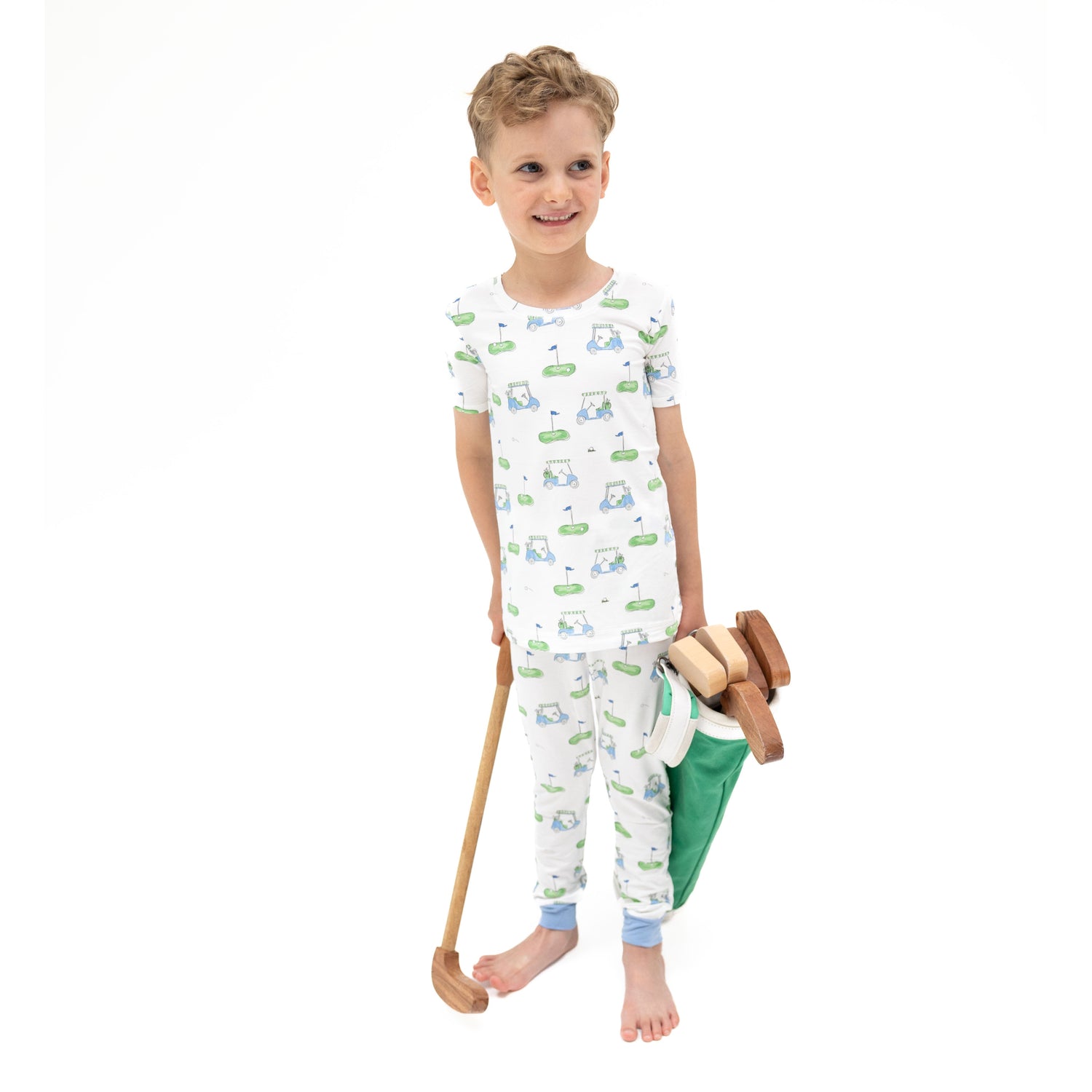 Two-piece short sleeve loungewear set with a blue golf cart print on the top and matching pull-on pants.