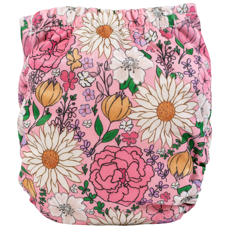 Floral patterned Tiny Tushies Newborn AIO cloth diaper.