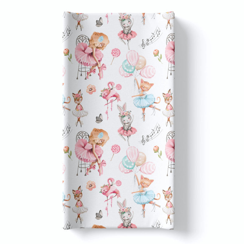 Ballerinas changing pad cover with soft fabric and playful design.