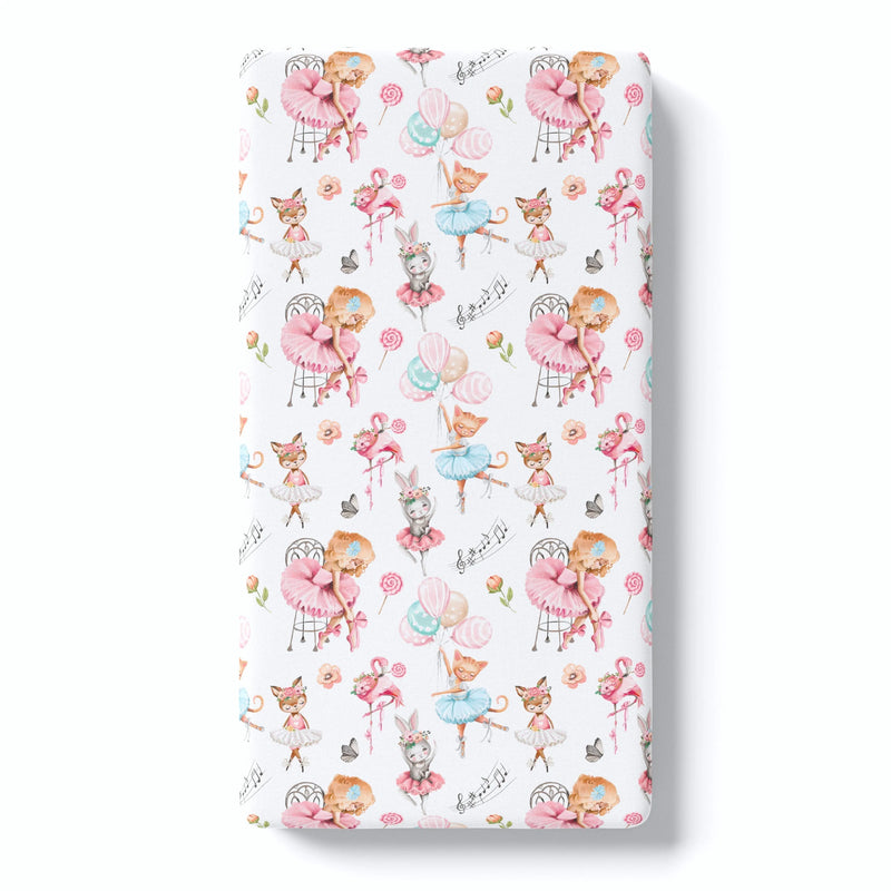 Fitted crib sheet with ballerina pattern, buttery soft fabric, fits standard crib.
