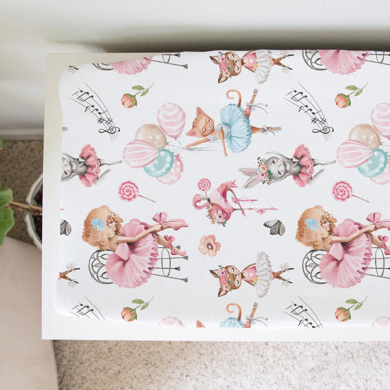 Ballerina-themed changing pad cover with soft, stretchy fabric.