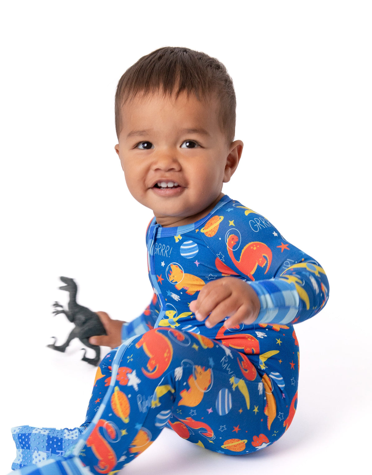 Electric Blue Space Dinosaur Bamboo Zip Onesie by Rayn’s Tiny Stitches