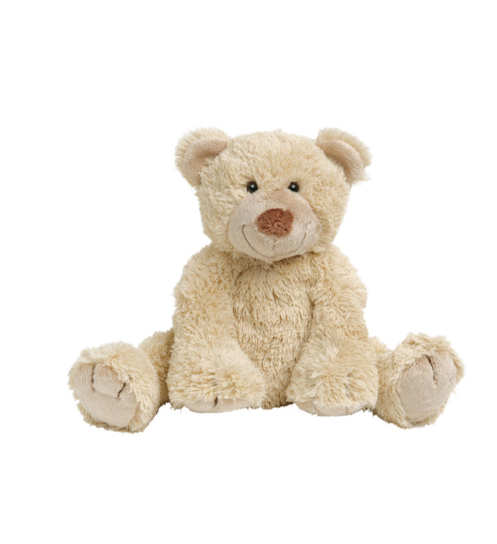 Soft beige plush teddy bear sitting upright with rounded ears and stitched features