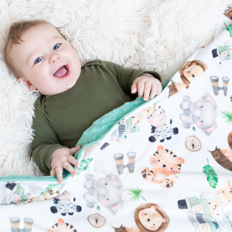 Premium baby and toddler minky blanket with safari pattern, soft and lightweight for nursery.